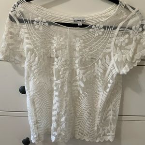 Cute white lace top. Rarely worn, great condition.